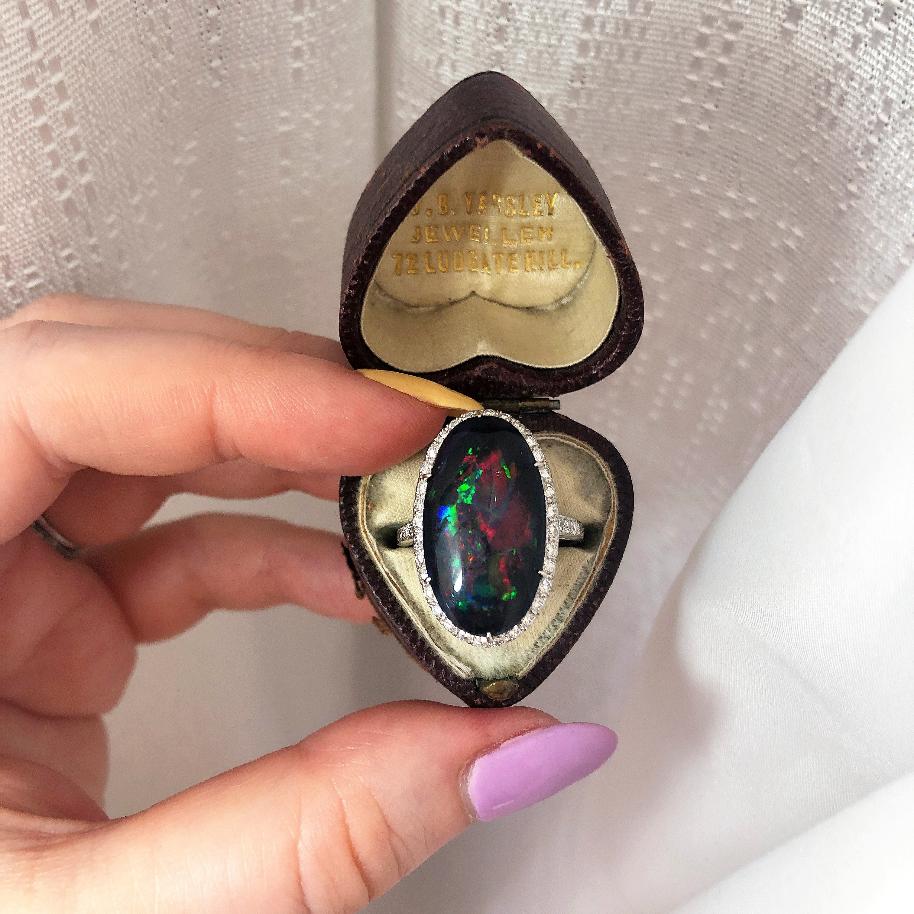 A rare and beautiful Edwardian era black opal ring from Under the Crown jewelry.
