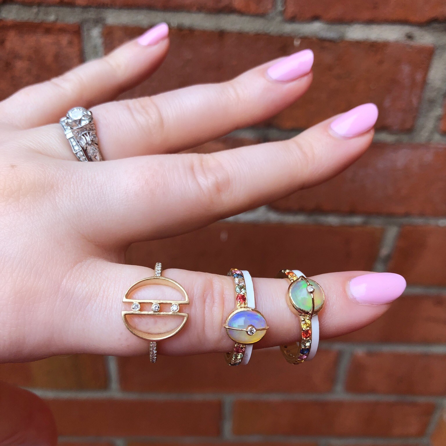 Stunning rings from Loriann Jewelry's latest collections! Diamonds, opals, rainbow sapphires, and white enamel on gold.