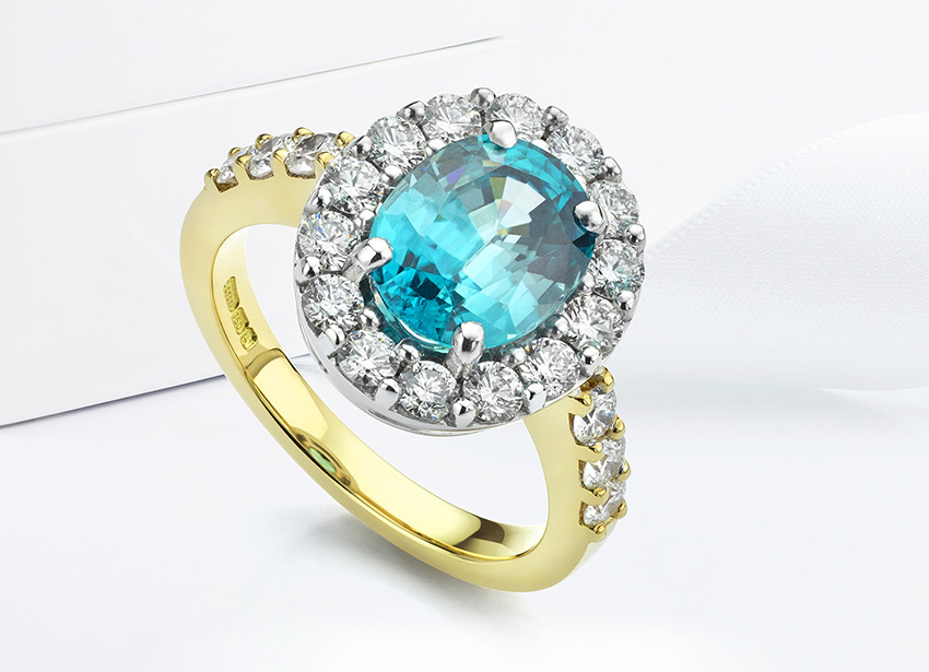 Blue Zircon and diamond cluster ring set into 18ct Yellow Gold