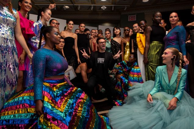 Models backstage at Christian Siriano's Spring 2020 show in New York.