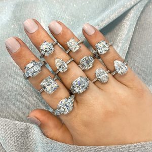 various diamond engagement rings on ladies hand new york city jewelry store diamond jewelry
