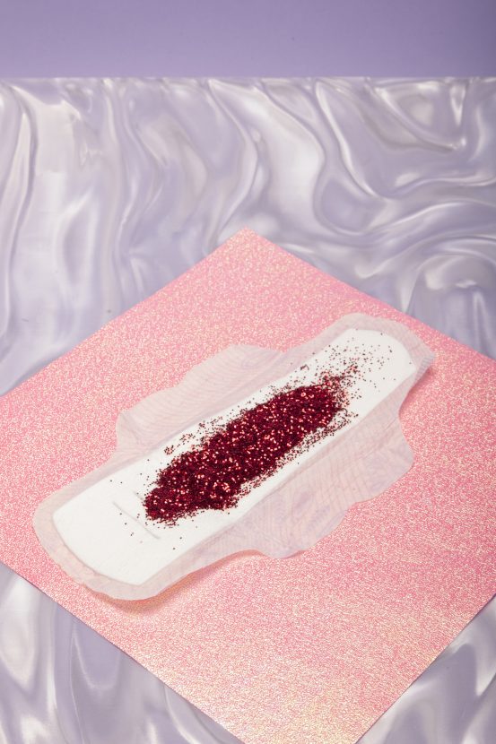 Missed period: A period pad on a pink background